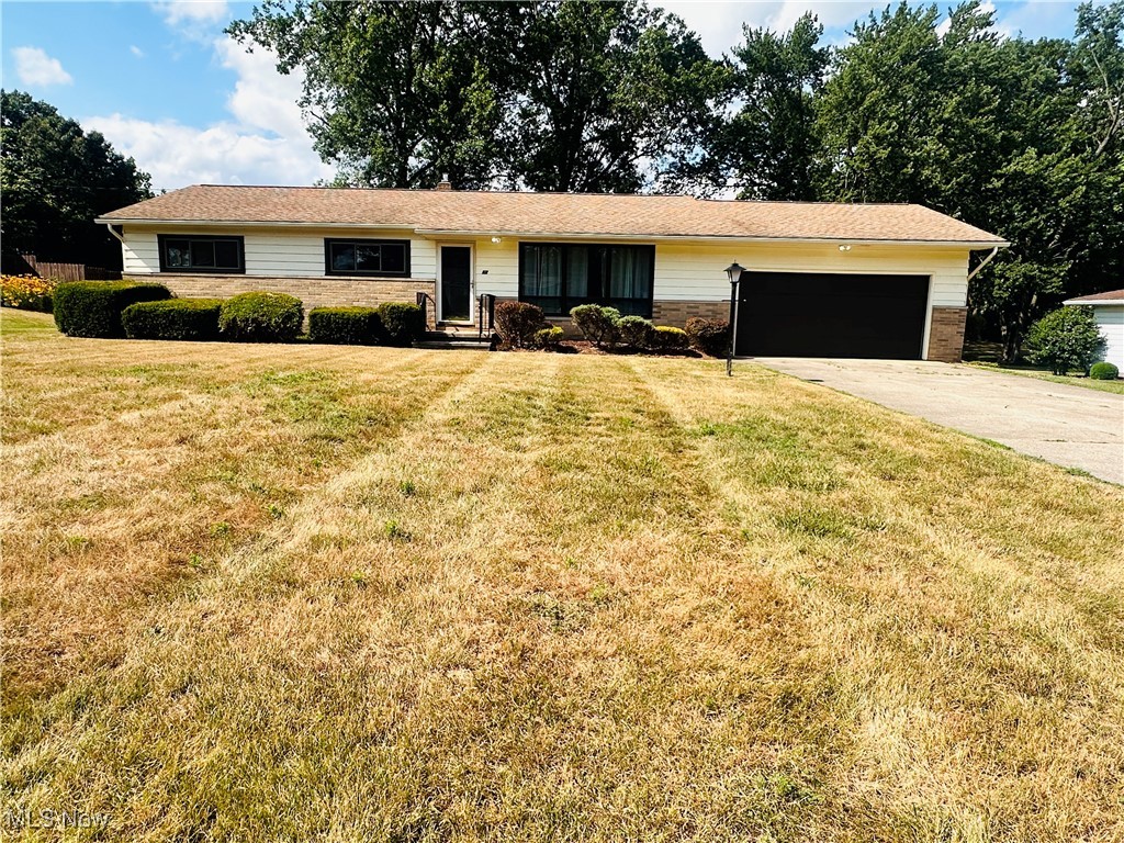 Welcome to 67 Moore Rd, a well-maintained and inviting Ranch available for lease in the heart of Green City. This charming home offers a blend of comfort, convenience and space for anyone looking to enjoy the peaceful surroundings of this sought-after neighborhood. The home features 3 bedrooms, 1.5 baths in 1344 sq.ft. of living space w/central air, attached 2-car garage, full basement w/laundry and a partially fenced backyard. Located just minutes from the scenic Portage Lakes, local shops, restaurants and major highways, this home offers the perfect combination of suburban tranquility w/urban access. Pets allowed.