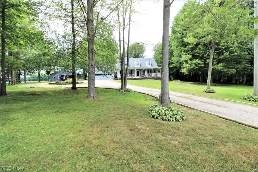 Welcome to this Beautiful and Well Cared for Cape Cod Home! Country Living at its Best! Upon entry from the Covered 8ft x 38ft decorative FRONT PORCH, inside to a formal entry w/sensational wood steps to the 2nd floor! First floor Bright and Cheery Living Room which carries so much bright sunlight and relaxing atmosphere. Formal Dining Room, centrally located kitchen with plenty of cabinets and counter space. Bonus Family Room with Propane fireplace and half bathroom. Down the hallway shows the First Level Master Bedroom. Upstairs to 3 nicely sized bedrooms, great closet space and 2 full bathrooms. Lower-Level basement offers so much desired extra room, laundry area, and walk out area. Out back is a Quiet & Quaint 15.7ft x 11.4ft back porch offering many opportunities to capture the wildlife, reminds you of sitting in a park-like setting, Babbling Creek and mixture of open land and trees! Can't forget about the 2-car attached garage to home, detached 4 car garage/barn with water includ