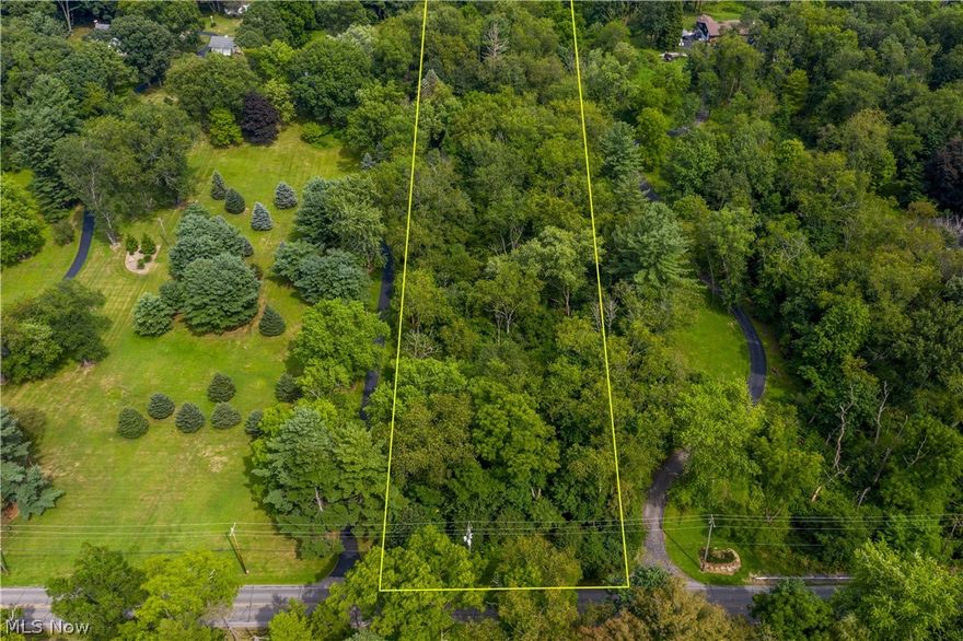 Great parcel with 6.92 acres.  There is 200' of frontage and a depth of 1,507.  Current zoning is 100 - AGRICULTURAL VACANT LAND.  Parcel is located between 3101 and 3033 Logan Way.  Wooded lot with mature trees.  Great private location for building your new home and listed under tax value.  Lot located in $200+ neighborhood of beautiful homes.