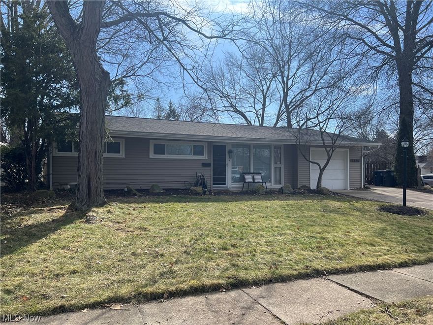 You are going to love viewing this fabulously maintained and updated ranch in West Akron.  You enter the front door to find a large living room with views into the bright white fully applianced kitchen.  The first floor laundry room makes doing the laundry a little less of a chore and there is an additional bonus room that can serve many purposes.  All 3 bedrooms are ample size with lots of closet space and window dressings.  Updates include:  New flooring (not bath or kitchen) 2018, French drains in back yard 2019, roof, complete interior paint and new patio 2020, new water heater 2022.  Call to schedule a showing today!