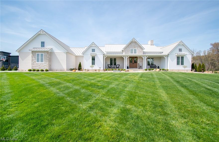 Absolutely Spectacular 3 Bedroom 3.5 Bath Custom Modern Farmhouse Home with 18 x 40 Inground Pool with automatic pool cover & Unbelievable Private, Scenic Backyard Paradise AND a 4 Car Garage. Home Features Include: Awesome Kitchen with Quartz Countertops, Trendy Backsplash, GE Café Matte White Appliances, 2 Stainless Steel Sinks, and Pantry. The Kitchen is open to the Amazing Great Room with Colored-Stone Fireplace. The Left Wing offers barn door access to storage closet, Large Laundry Room with Cathedral Ceilings, & Stunning Master Suite with Fandalier, His & Her Walk In Closets & Spacious Master Bath with Floor to Ceiling Trendy Tile Shower, Jacuzzi Tub, & Double Vanities. The Right Wing offers 2 Large Bedrooms with Mini Walk in Closets & Private Baths each with a Linen Closet. There is also a Private office & Half Bath. The Back Sun Room with Epoxy Flooring offers Amazing Views of the In Ground Pool & Private, Scenic Backyard. The Half Bath is conveniently located off the Sun Room for easy access from the pool. There is also a perfectly placed window over the kitchen sink with sun room, backyard, & pool views. Upgrades offer: 16 Zone "smart" Irrigation System, over 15 exterior can lights, 50 Year Steel Roof, Pella Windows, 13 Course Basement, Gas Hookups for Grill, 3 Zoned whole home Radiant Heat, heated garages, Tankless boiler, On Demand Water Pressure, Generator Hookups, central vac, & motion lights in garage.