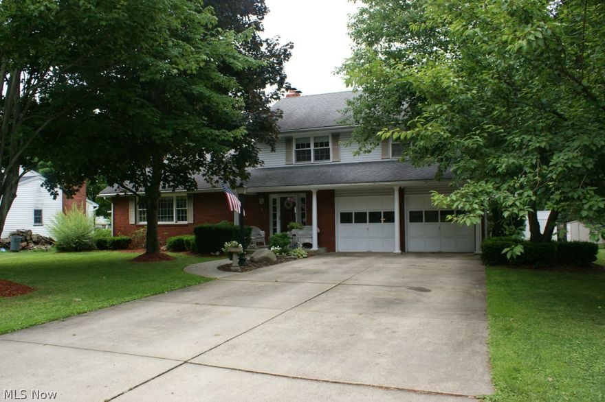 This outstanding colonial has 3 bedrooms & 3 full baths over 2200 sq. ft. with beautiful hardwood floors throughout. You will love the huge living room w/entertainment center. The extra large kitchen w/built in appliances, Jen-Air stove top w/grill & double oven for those family dinners. Lots of cabinets & huge pantry, island w/3 bar stools. Entertain in summer months in the beautiful 4-season Florida room (w/plenty of storage areas)  leading to the 20 x 40 heated in-ground pool w/diving board & slide. Patio w/3 fans & TV attached. There is a full bath off Florida room. 1st floor laundry, family room w/fireplace. Master bedroom w/master bath separate dressing area w/plenty of closets. Finished rec room plus another room that is a bar room w/bar chairs. Central air. Double garage & so much more!