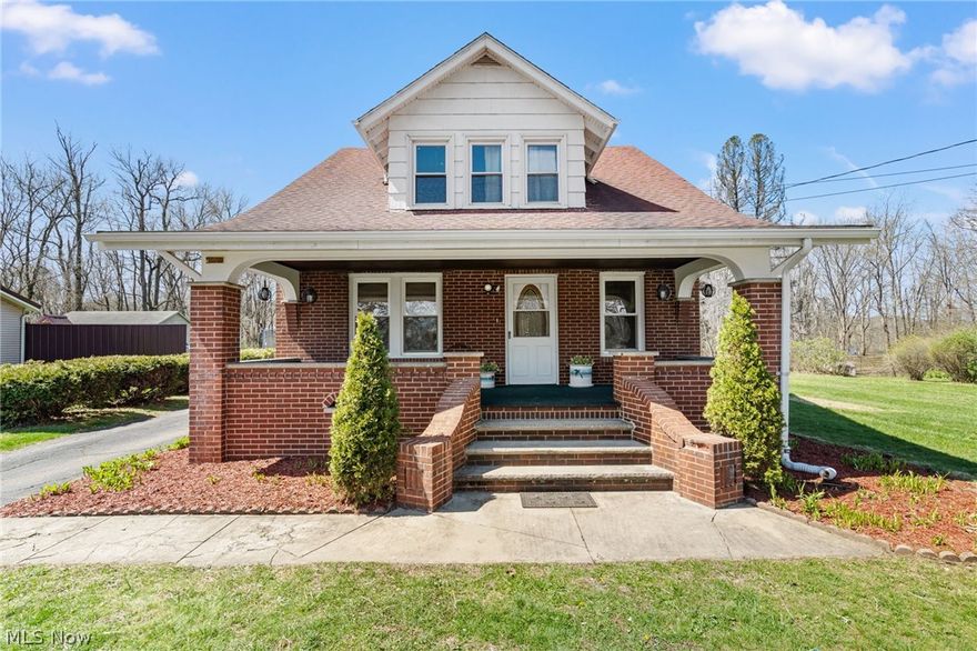 Don't miss out on this beautiful, well maintained property set on just under an acre in a prime location, only 15 minutes from Canton and 10 minutes from Sandy Valley Schools! This spacious brick home is truly move-in ready and waiting for its next lucky owner. Featuring 3 bedrooms and 3.5 baths, it offers flexibility and comfort for any lifestyle. Over the past 7 years, major updates have been completed, including electric, kitchen, plumbing, septic, and roof, with brand-new garage doors just installed on the detached 2-car garage. The open-concept layout is perfect for everyday living and entertaining, while the finished basement provides additional space for gatherings or extra living space. Enjoy the wonderful backyard, ample parking, and everything this home has to offer!  This is one you don't want to miss!