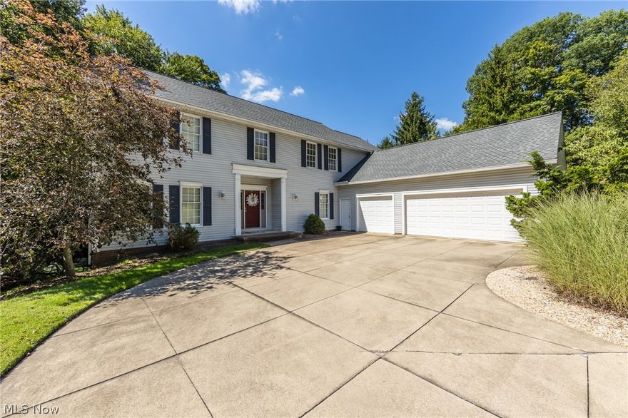Wow!  An amazing 4 bedroom 3 bath colonial in the desirable Lake of the Woods neighborhood.  With almost 4000 sq ft of total living space, this home features a walk out basement with rec room.  The private and wooded 1.4 acres has a stream, wonderful landscaping, and a deck to enjoy the quiet.  A large great room has a stone fireplace, and the office steps up.  The formal living room and dining rooms have a fireplace as well.  The eat in kitchen has 2 story windows to enjoy the amazing view.  The second level has 3 ample sized bedrooms, including a large master suite, and a nice sized loft area.  There is a first floor bedroom, first floor laundry, and a first floor full bathroom.  The many updates include roof (2019), furnace, a/c, gutters, and more.  There is a 3 car garage, ample storage, and much much more.