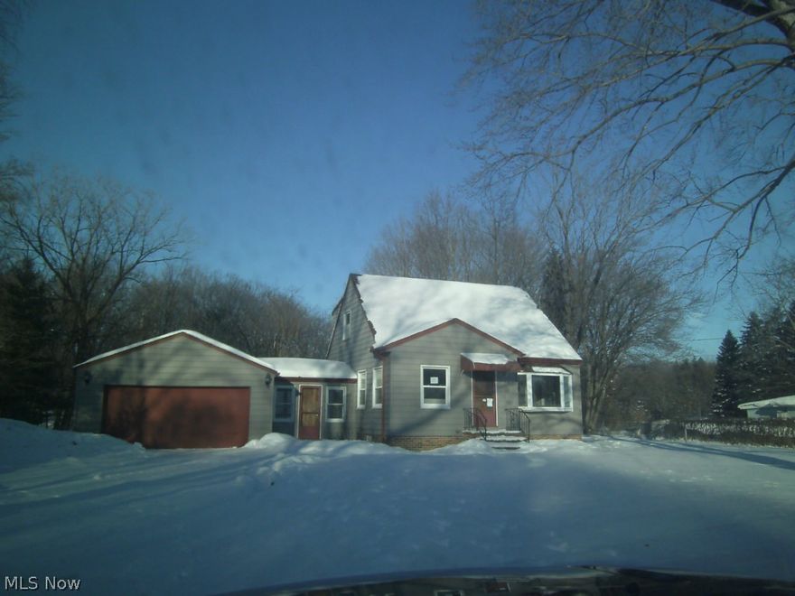 3 bedroom 1 bath bungalow upstairs can be finished into either a master suite or 4th bedroom - updated kitchen -  with breezeway connecting to 2 car garage - over an acre lot.  Close to schools, shopping, hospitals with easy access to downtown Cleveland.