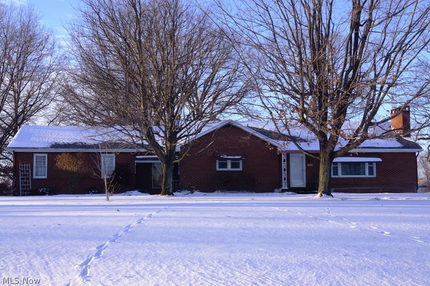 Quality built brick ranch home situated on 12.6 acres. Large eat-in kitchen, huge living room with wood burning fireplace and built-in book shelves, 3 bedrooms with hardwood floors, family room with wood burner. Newer roof 2003, updated electric 2004, submersible pump 2007. 2 car attached garage plus 24x32 detached garage/shop wired for air compressor and welder. 30x40 bank barn. Wooded acreage full of wildlife. Pave driveway. Second owners-well maintained.