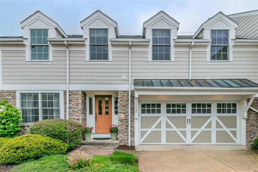 Welcome home to this stunning condominium in the heart of Chagrin Falls! This 3 bedroom, 3.5 bath home offers an open floor
plan and an array of appealing features, perfect for comfortable living and entertaining. Entry opens to the dining room or office space. The expansive family room features high ceilings, gas fireplace, built-ins and access to the deck. The spacious kitchen is a true highlight, featuring a large center island that provides ample counter space and a natural gathering point. It's equipped with stainless steel appliances, granite counters and modern fixtures, creating a stylish and functional culinary space. Conveniently situated on the first floor, the primary suite serves as a serene retreat. It offers a large, spa-like bath, designed as a perfect oasis for relaxation. Ascending to the second floor, you're greeted by an open and spacious loft area, which leads to two generously sized bedrooms and a shared bath. This layout provides privacy and comfort for family or guests. The lower level adds additional living space, ideal for a recreation area or home office along with a full bath and storage areas. Beyond the home's impressive interior, its prime location is a significant asset. With downtown Chagrin Falls just steps away, residents can enjoy easy access to an array of boutique shops, gourmet restaurants, and vibrant community events, allowing them to fully embrace the quintessential charm of this picturesque locale.