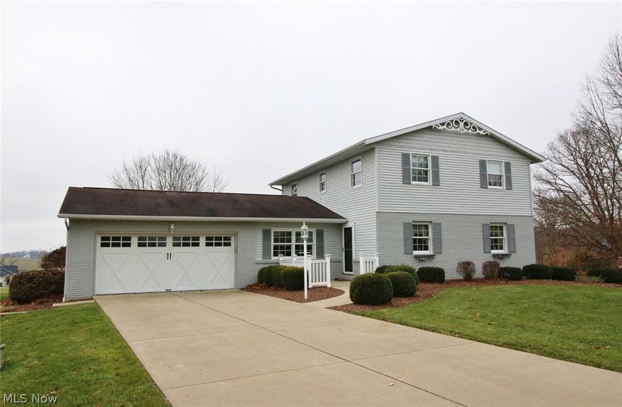 Charming home located in Oakwood North at the end of the cul-de-sac with a nice sized yard.  Approx. 2800 sq. ft of living space and modern conveniences such as a whole house generator, corian counter tops, newer lighting, 4 season sunroom and recently finished basement. Expansive back deck overlooking the neighborhood, great for entertaining!   Large shed in the backyard has electric. Rented water heater. Additional lot in the rear of the property (Oakwood North III) is available for $29,900.