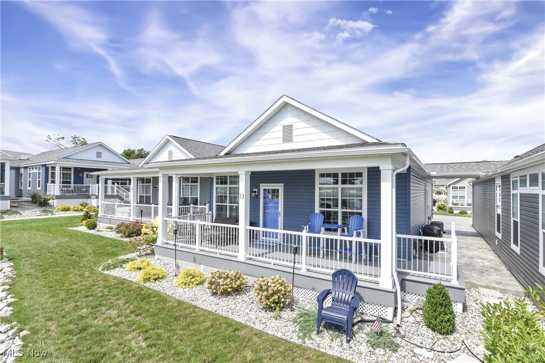 Rare opportunity to own a Canal-front unit! This 3-bedroom, 2-bath home features coastal decor and bright, open spaces with stunning water views. Relax with morning coffee as boats pass by, or enjoy the changing Fall leaves from your front porch. Located in a private gated community with resort-style amenities, this home is the perfect mix of comfort, charm, and lifestyle.