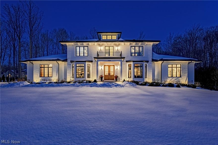 One of the finest homes ever on offer in the community of Canyon Lakes, this home is the epitome of bespoke design and exquisite detail. Recently finished in 2020, the architecture of the home is evocative of early 20th century elegance, yet perfectly suited to the needs and demands of modern living. Once inside, the incredible craftsmanship is immediately evident, from the rich millwork to the tasting room complete with a wine refrigerator and cigar humidor. The gourmet kitchen is open to the living and dining room, with wood burning fireplaces nestled in each. The kitchen boasts a sixty inch Hallman range, custom quartzite counters and an oversized eat-in island with contrasting cabinetry. Directly off the kitchen, the living room opens to a screened-in porch with an additional third fireplace. With a custom walk-in closet, a spacious bedroom, a laundry room, and a luxurious en-suite bath, the owner's suite provides spa-like comfort with picture-perfect finishes. Two powder rooms, a