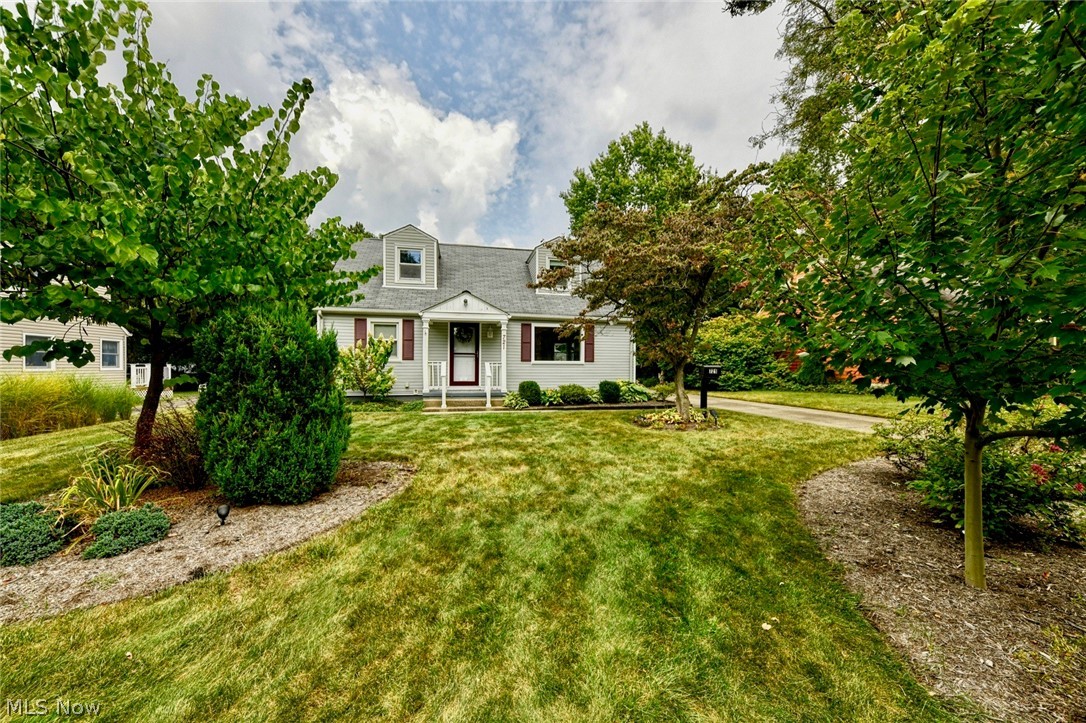 Welcome Home to your new 3/4 bedroom home in Kent, Ohio with vinyl & aluminum low-maintenance exterior! Situated a comfortable walking distance from Kent State University on a beautiful dead-end street off Morris Road, there's a lot to love! Gorgeous manicured lawn w/ perennial plantings & front bed set off by white picket fencing & landscape lighting give this immediate curb appeal! First Floor bedrooms have beautifully restored hardwoods. Living room also boasts original BEAUTIFUL refinished hardwood! New vinyl laminate plank flooring in kitchen/dining room Plus family room entry & closet! Upper two bedrooms boast knotty pine construction, one with paint, the other rustic w/ natural finish (very lodge-y!). Huge family room addition w/ wood burning fireplace & new carpeting (9/2019), large coat/storage closet and built-in cabinetry along with an adjoining 3-season sun room make this a unique find among Kent's 50's Cape homes! Two FULL baths in great condition--one remodeled! Kitchen o