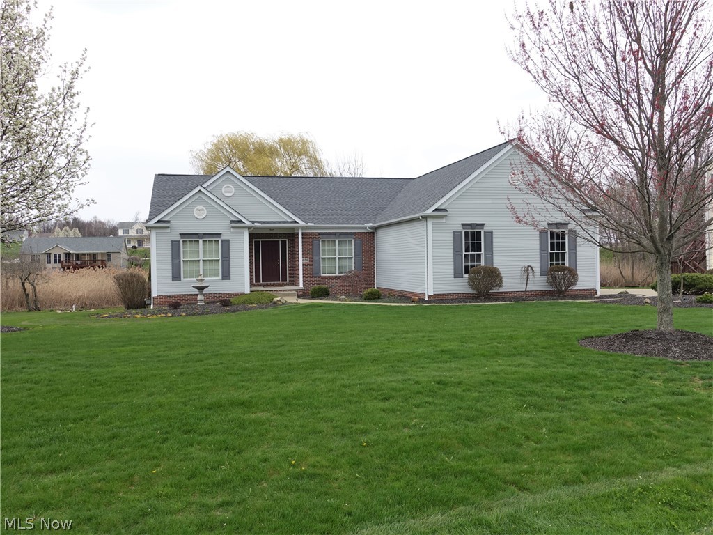 Built in 2004, this beautiful custom built ranch home is located in the King Ridge community! The open floor plan features spacious great room with gas fireplace. Huge kitchen features Kraftmaid kitchen cabinets, nice built in pantry with pull out drawers, stainless steel appliances, nice solid surface counters with breakfast bar and an awesome vaulted sunroom/eating area with walls of windows to allow for an abundance of natural light and sliders to the deck and beautiful back yard. Bonus room with French doors can be used as an office or dining room. Good size master suite featuring 7 x 6 walk-in closet and master bath with double vanity, nice storage, walk in shower, soaking tub & heated towel rack! Two additional bedrooms with nice closet space, first floor laundry with sink. Beautiful hardwood floors in foyer, great room, kitchen and hallway. Basement can be easily finished, offers egress windows and has plumbing for bath. Recent improvements include: Roof replaced – Oc