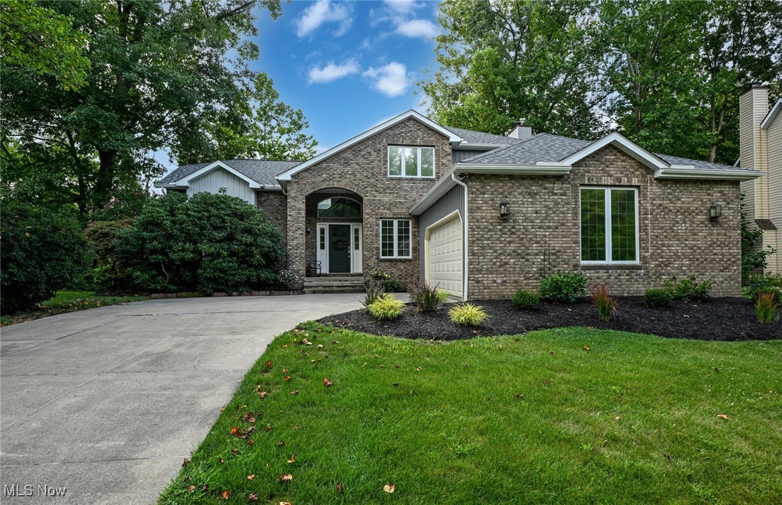 Discover this impressive 4-bedroom, 3.5-bathroom home spanning 3,715 square feet of living space in the highly sought-after Brecksville community. This exceptional property sits on a private wooded ravine lot, offering serene natural views and enhanced privacy.
The heart of this home features a fabulous renovated kitchen that serves as the perfect gathering space for family meals and entertaining guests. Wood LVT floors guide you throughout the thoughtfully designed open layout which flows seamlessly throughout the main living areas, creating an inviting atmosphere for both everyday living and special occasions.
Upstairs, you'll find 3 spacious bedrooms including the primary ensuite and 2 renovated baths.
The walkout finished lower level maximizes your living space with a huge recreation room with full sized windows and sliding glass doors. This level also includes a convenient 4th bedroom, full bathroom, and dedicated gym space, allowing you to maintain your fitness routine without leaving home.
Recent updates include a newer roof and siding installed in 2024, providing peace of mind and enhanced curb appeal for years to come. The property benefits from its location within the top-rated Brecksville school district, making it an excellent choice for families prioritizing quality education.
The wooded ravine setting creates a park-like atmosphere while maintaining convenient access to downtown Brecksville and local amenities like shopping and restaurants. Outdoor enthusiasts will love the close proximity to the stunning Brecksville Reservation and Cuyahoga Valley National Park providing endless hiking trails, scenic beauty, and nature exploration right at your doorstep.
This home perfectly balances suburban comfort with natural tranquility, creating an ideal environment for relaxation and recreation. The combination of updated features, spacious layout, and prime location makes this property a rare find in today's market.