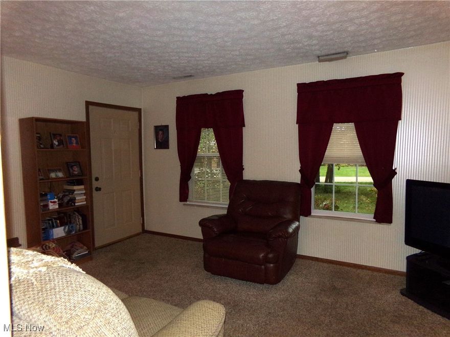 Welcome to this well-maintained, 3-bedroom condo nestled in a quiet community in North Canton and just minutes from Belden Village. This home features a large living room with a wood-burning, stone fireplace as a great focal point and has large windows for plenty of natural light! You'll enjoy the spacious eat-in kitchen that provides plenty of room to host dinners and cookouts with family and friends, as the dining also that leads out through sliding doors to the back patio and semi-private back yard. Another added convenience is the powder room on the first floor. There are 3 bedrooms and a full bath on the 2nd floor, and if you need closet space, you'll find plenty there as well!  The first-floor laundry area provides easy access to the mechanicals, and the one-car garage leads right into the dining-kitchen area, making it nice when bringing in groceries. Get ready to call this one, "Home!" Schedule your showing today!