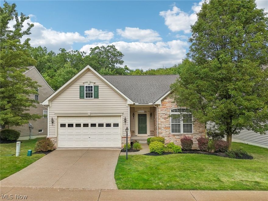 Welcome to the desirable, cluster home development at Willow Creek that abuts the Sand Run Metropark! This stunning, move-in ready home offers a blend of elegance and functionality, while showcasing a first floor master suite!
As you step inside, you're greeted by gleaming hardwood floors and a spacious two-story great room with sweeping ceilings. The great room, adorned with large floor-to-ceiling windows, fills the space with natural light and offers serene, wooded views. Glass French doors open to the den nearby, providing the perfect space for an office, media room, or crafting.
The beautiful, gourmet kitchen features extensive cherry wood cabinets, granite countertops, stainless steel appliances, and an inviting eating area with sliders to the expansive balcony deck. Perfect for entertaining, the deck overlooks the private, wooded .12-acre lot.
On the main level, you'll find a luxurious owner’s suite complete with a tray ceiling, walk-in closet, and an ensuite bathroom boasting double sinks, a large soaking tub, a separate shower, and a private commode area. Additionally, the main level hosts a second bedroom, a full bathroom, and a convenient laundry room.
Upstairs, a loft area, a spacious third bedroom, and a full bathroom provide additional living space. 
The sprawling basement offers walk-out access to the yard, perfect for future expansion or storage. 
Located in the highly sought-after Revere school district, this home also features a two-car attached garage and numerous updates throughout. 
Imagine having the beauty of the Metroparks’s nature in your backyard, without any of the upkeep – truly an outdoor oasis after a long day at work! The HOA handles the landscaping and snow removal so all you have to do is relax!
Don't miss the opportunity to make this exquisite Willow Creek property your own!