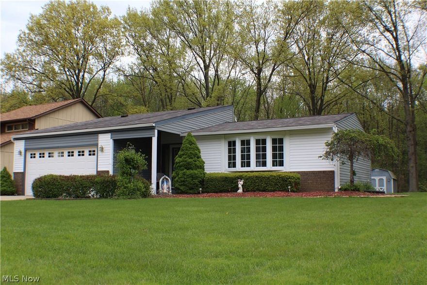 Beautifully maintained and updated ranch style home.  Owner has been meticulous in the upkeep on this home and the pride of ownership shows in the details.  This home features a large master suite with a spacious bathroom and large closet as well as a sunken formal living room.  Relax in the family room or dining room while you view the park-like backyard and woods behind from the large windows and glass sliding doors.  Or set up your patio furniture on the rear patio and sip your coffee while enjoying the peaceful sounds of nature.  Basement is set up to do canning with a 2nd stove and storage space.