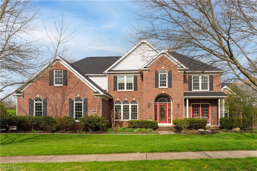 Stunning home on a double lot in the prestigious Monticello community! Offering over 5,600 sq. ft. of bright, airy living space, this expansive floor plan is designed for both entertaining and everyday living. Featuring 5 bedrooms, 6 bathrooms, a partially finished walk-out basement, and a heated 3-car garage, this home truly has it all. A grand foyer with a statement chandelier welcomes you inside, flanked by a formal dining room with arched entryways and accent pillars, and a cozy family room with front porch access. The two-story great room showcases a gas fireplace and arched windows that flood the space with natural light. The open eat-in kitchen is a chef’s dream, complete with an oversized island, stainless steel appliances, rich wood cabinetry, and a fully equipped smart sink. The dining area leads to a second-story deck overlooking the backyard. Set on a combined 1.08 acres, the outdoor space is designed for relaxation and entertaining, featuring a spacious deck, patio, fire pit, covered patio, and three water features. Tucked behind the great room an office with double doors and a convenient first-floor in-law suite, offering a spacious bedroom with an ensuite featuring a soaking tub and separate shower. A laundry room with ample storage completes the main floor. Upstairs, are four bedrooms with walk-in closets and three full bathrooms, including the luxurious primary suite. Enter through double doors into a retreat featuring a private fireplace, sitting area with serene views, spa-like bath with jetted tub, double vanity, tiled walk-in shower, and an impressive 14x17 walk-in closet. The finished walk-out basement is built for entertaining, offering a large rec room, full bar, pool table area, half bath, sauna, and access to the patio. Located in a desirable neighborhood with a clubhouse and pool, this home is just minutes from schools, shopping, highway access, and Gervasi Vineyard. Schedule your private showing today! EXTERIOR IS SCHEDULED TO BE PAINTED.