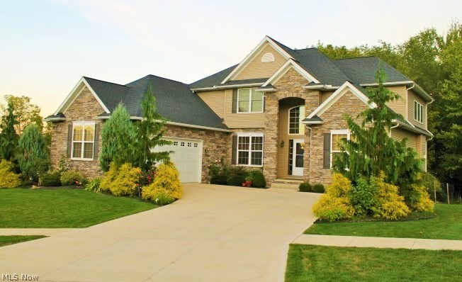 4 Long Vue Ct. Quality Schlabach two-story home, 5 Bedrooms, 3.5 Baths, 3538 wonderfully-finished sq. feet. EXCITING, two-story great room with lots of glass, granite kitchen, 1st floor master suite, with HUGE walk in closet, and luxurious master bath with jet tub and rain shower. Completely finished walkout lower level with lots of daylight, high ceilings and same solid, 6-panel doors and trim package as rest of home. Walk out to a large trex-deck up or patio below with woodsy view out back. Hardwood floors, tray ceilings, quality materials. This home is so well cared for, you’d swear it was a new-build. Handsome first-floor office and spacious 14x15 bonus 5th bedroom or media room in lower level. Desirable neighborhood close to medical, shopping, dining with miles of sidewalks.