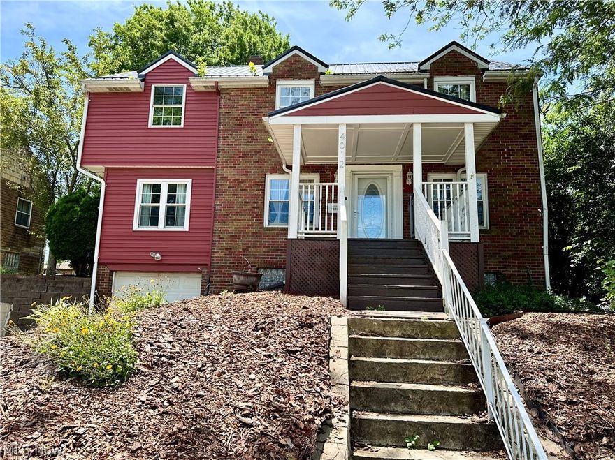 Welcome to this stunning 4-bedroom, 2-bathroom residence, nestled in one of the most sought-after neighborhoods in Weirton, this home offers the perfect blend of luxury and comfort. Gorgeous tile flooring connects the kitchen, dining room and living room, highlighting the convenient flow of the first floor plan. The fully equipped and beautifully designed kitchen boasts quartz countertops and stainless steel appliances and is open to the dining room, making it perfect for family meals and entertaining guests.  Relax in the spacious living room, which features the decorative fireplace, the perfect focal point. Enjoy the convenience and privacy of a generous master suite located on the main floor while you appreciate that all 4 bedrooms showcase brand new carpeting, providing a plush and inviting atmosphere. Need a little more space? The basement offers a versatile rec room and a dedicated laundry room, adding to the home's functionality. Don't forget you also have your own outdoor haven! Step outside to a fenced-in, shaded backyard complete with a delightful covered deck and a handy shed for extra storage. This home is a rare find in a highly desirable location. Don't miss out on the opportunity to make it yours. Call today to schedule a viewing!