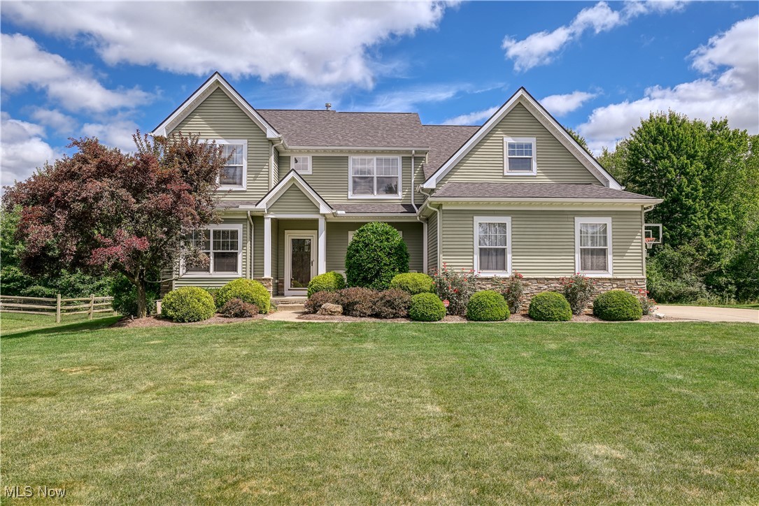 Don't miss your chance on this one! This one owner custom built colonial has amenities galore! Beautiful Brazilian hardwood floors on the first floor- from the foyer thru the kitchen & dining areas to the living room with custom inlaid carpet. Numerous updates include: newer "leathered" granite kitchen countertops and island, roof -2023, newer crown molding & trim throughout, newer hot water tank-2024, newer carpet in finished lower level, newer quartz countertops & vanities in both full baths. You will love the second level- with all four great sized bedrooms plus the multi-use loft area... waiting for your own personal "spin" on its' use. (Think: sitting area, play area, gaming space, studio) The primary suite with tray ceiling has 2 walk-in closets. The generous sized primary bath offers a large walk-in glass & tile shower, plus updated, vanity, quartz countertop & new fixtures. The finished lower level offers an additional 500+ sq ft of living space! There is a half bath, large closet and additional storage. Back to the main level-from the kitchen is easy access to the stone paver patio w/mature landscaping offering peaceful privacy! Make sure to put this one on your list today!