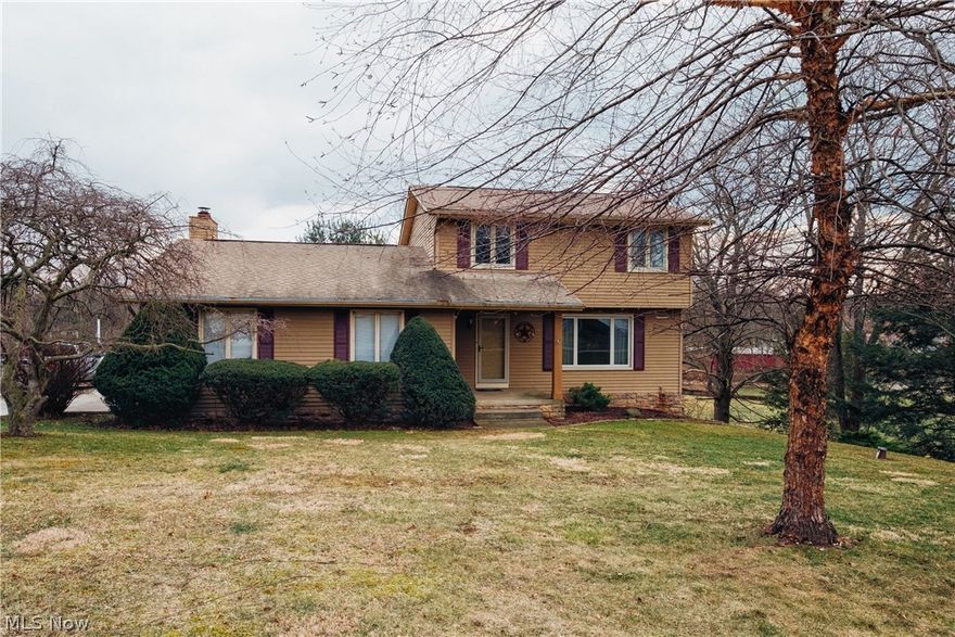 Welcome to this beautiful nicely updated home set in a wonderful park like setting. This home has three bedrooms and 2 full baths.  The Master bedroom walks into the 2nd floor full bath to create a Master ensuite. The first floor has a second full bath, large living room, formal dining room, fully applianced kitchen and a wonderful family room with a wood burning fireplace.  The family room walks out to a nicely appointed screened porch and rebuilt deck.  The lower level offers additional living space with a very large rec room with bar area. This home offers plenty of storage in the unfinished portion of the lower level, the two garage and the large storage shed.  The updates include: Fresh paint throughout, new carpet in dining room and living room, Garage door 2015, Furnace /CA 2015, Pella windows 2014, Roof 2013. Home has a radon mitigation system that was installed when seller purchased this home.