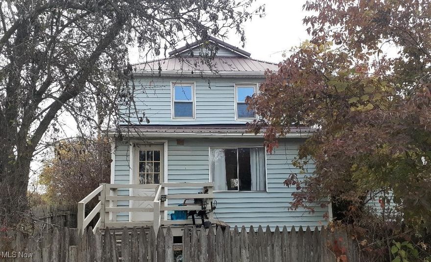 Located outside of the quaint Village of West Salem, in Ashland County, and Black River School District. Colonial situated on 2.76 acres, featuring 3 brms, and 2 full baths, 3rd brm located in lower level with walk-out. Main floor living rm, dinning rm, family rm, front and back enclosed porches, and a full bath. Second floor has 2 nice size brms, bonus sitting rm/office, and full bath Lower level is partially finished with 3rd bedroom/rec rm and 2 additional unfinished rooms. The garage/building is 24x32 with a 10x28 lean and has been converted to a hobby dog kennel with insulated ceiling/walls, overhead heater, water, and indoor/outdoor access doors, had been set-up with 7 kennels, with room for additional kennels. There is a 24x32 Barn with 3 stalls with 2 pasture areas. Home has had several major updates over the years to include- Public Water installed July 2025, Metal roof on house and garage/kennel building replaced, metal siding to barn and garage/kennel building 2020, boiler system about 9yrs age and new pressure tank for boiler 7/25, blacktop base under gravel driveway, small deck and new steps front porch, barn built 2002, and a shed we had built 2021 approximately 11 x11 used as a outdoor cooking shed, cold frame for garden plants, and she shed. Ready for your personal updates. Selling "AS IS", cash or conventional financing.