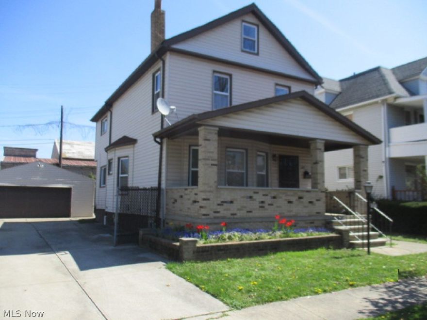 Beautiful curb appeal from this colonial! Relaxing front porch. Bay window in living room. Formal dining room. Huge gourmet kitchen area needs full remodel. Basement has tile flooring, laundry area, half bath and storage room. Upstairs features huge full bath and four spacious bedrooms! Master has walk in closet and glass sliders to attached balcony facing rear yard. 2-car detached garage. Nice, freshly paved street. Needs TLC. Employees and family members residing with employees of JPMorgan Chase Bank, N.A, its affiliates or subsidiaries are strictly prohibited from directly or indirectly purchasing any property owned by JPMorgan Chase Bank, N.A.  Don't miss this opportunity!