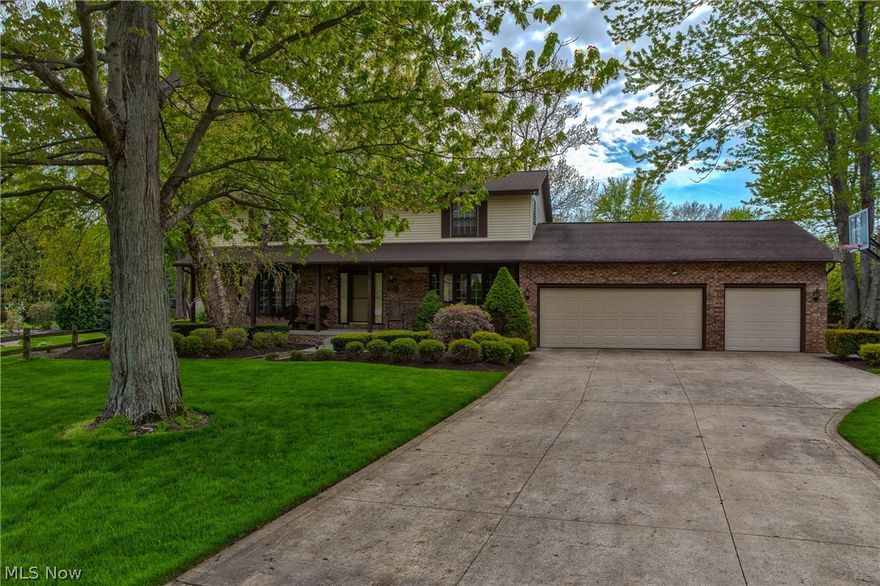 Picture Perfect!!!  Folks this is hands down the best home available in Mentor!  Directly pull up from the cul-de-sac drive and come see for yourself,  the warm and peaceful front porch you've been longing is the perfect place to start! Step inside on the 3/4 inch true hardwood plank style flooring gives that extra comfort and easy living lifestyle we all desperately crave!  Open Eat-In Kitchen complete with Upgraded stainless steel appliances, BEAUTIFUL granite counters, undermount sink and Custom Amish built cabinets. All the glory is yours while family and friends are hanging out in the family room or out on the back deck enjoying the Beautiful back yard you'll be whipping up those summer meals in no time!  This is something you have to see to believe, so come on out and my guess is you will want to hang around a while...