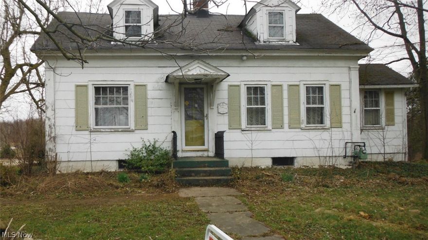 Cute Bungalow styled home located in Auburn Township.  This home boasts 1351 sq ft. with 1.87 acres of land. Featuring 3 spacious bedrooms; 1.5 baths.  Hardwood floors throughout.  Wood burning fireplace in living room with built ins.  Formal dining room.  Kitchen provides ample cabinetry.  Full basement for extra storage.  Great location!! Lots of land to have a garden.  Add your decorating ideas and make this your home. Schedule your showing Today!!