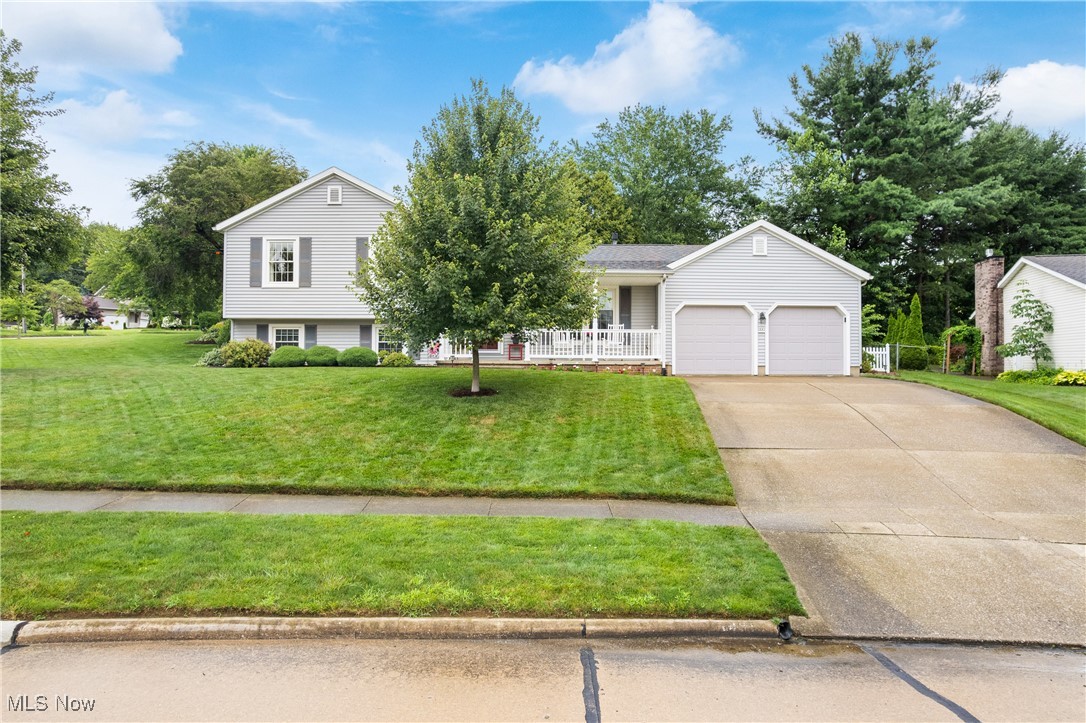Tucked into a quiet neighborhood, 1881 Edwards Drive is a one-owner, beautifully updated gem with space, charm, and comfort to spare. From the stylish kitchen with hickory cabinets and quartz counters to the abundant built-in cabinetry throughout, this home blends function with flair. Multiple living areas, including a living room, family room, and rec room, offer versatility for entertaining or relaxing, while the serene patio and spacious yard invite peaceful outdoor living. A large laundry room with custom cabinetry accommodates a home office, as well. The oversized garage has plenty of space for a shop or to accommodate your storage needs. Other conveniences like updated windows, a storage shed, and so much more ensure that living here is as stress free as possible. Impeccably maintained and full of thoughtful updates this one's ready to impress. Schedule your tour today!