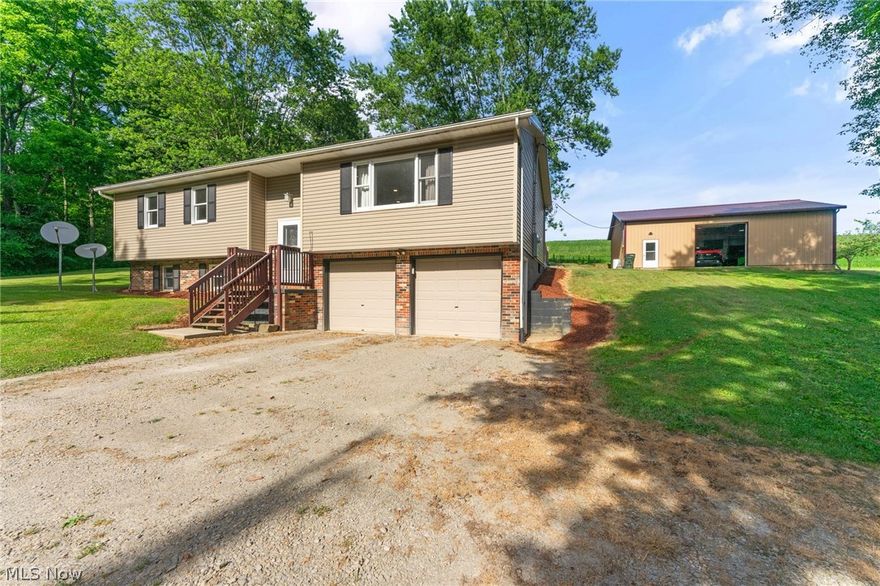 Nestled on a serene one-acre lot in the countryside, this beautifully updated 4-bedroom bi-level home offers modern amenities with rustic charm. The property features a spacious 40x32 outbuilding equipped with electricity, high ceilings, and heating, providing ample space for your hobbies and storage needs. Step into the main floor and be greeted by an open-concept living area. The large kitchen island with quartz countertops, brick backsplash, white soft-close cabinets, and stainless-steel appliances serves as the heart of the home. Enjoy meals in the eat-in area with direct access to the back deck, perfect for outdoor dining and entertaining. The living room seamlessly connects with the kitchen, showcasing new LVT flooring throughout and recessed lighting. The main floor hosts 3 generously sized bedrooms, each with ample closet space. The master suite features a walk-in shower, offering a private retreat. The updated full bathroom includes tile flooring, a tub with tile walls, and a farmhouse-style, double sink vanity. The lower level adds versatility to the home with a fourth bedroom that can double as a family room, featuring double closets for extra storage. Additionally, the basement includes a laundry room, more storage space, and another full bathroom, enhancing the home's functionality. An attached two-car garage provides convenience and additional storage. Features: Gordon Bros Chlorination water system, Sewer Septic, Forced Air Furnace/Heat pump (AC), Metal roof, Updated light fixtures and Freshly Painted interior. United School District. This property is perfect for those seeking a peaceful country lifestyle with modern updates and the bonus of a large outbuilding. Don’t miss out on this exceptional home at 8184 Rochester Rd. Schedule your private tour today and experience the perfect blend of country living and contemporary comfort.