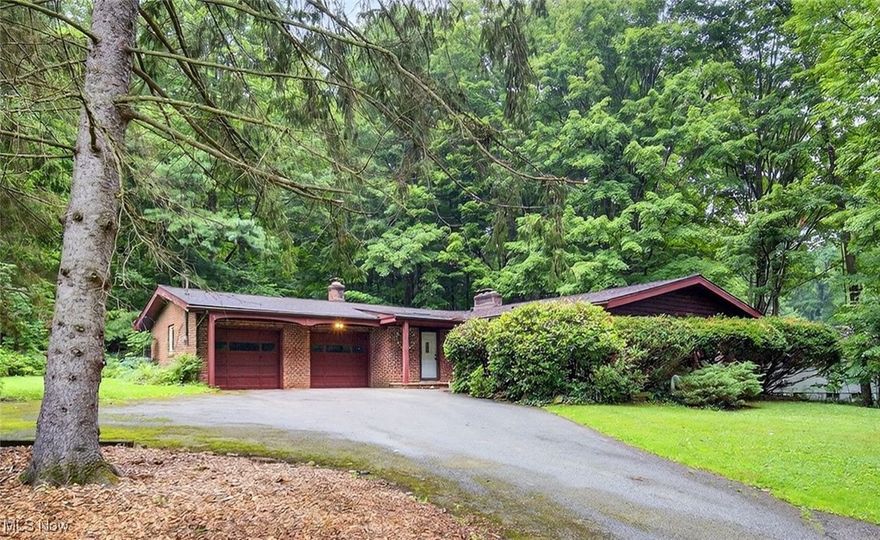 Welcome to this well-maintained, single-owner 3-bedroom, 2-bath ranch tucked away on a beautiful 1+ acre lot in one of the area’s beloved lake communities—just minutes from the storied Chagrin Falls waterfall, charming shops, and local dining. Inside, you’ll find beautiful hardwood floors throughout and a welcoming entry foyer with stone floors and a large coat closet. The primary bedroom features a private full bath, and two additional bedrooms offer comfort and functionality, complemented by updated bathrooms with ceramic tile flooring. The eat-in kitchen opens to a dining area with a cozy fireplace—perfect for gathering and entertaining. You’ll also enjoy additional fireplaces in the family room and basement rec room.

The basement offers not only additional living space but also ample storage for all your needs. Washer and dryer hookups are available on both the first floor and in the basement—allowing flexibility based on the new owner's preference.

Major systems have been thoughtfully maintained, with annual service recently completed on the heating, cooling, and large hot water tank. A new water pump was installed in June 2025 and comes with a 2-year transferable warranty. The roof was replaced in 2016.

A private, peaceful backyard with a patio provides the perfect setting for relaxing or hosting. The home includes a convenient two-car attached garage plus a separate storage shed for extra space. As a part of the Bellwood Lake community, you’ll have optional access to the neighborhood pavilion, beach, dock, fishing, canoeing, and more. Located in the award-winning Chagrin Falls School District and offering the benefit of Geauga County taxes, this home combines comfort, quality, and an unbeatable location. Do not miss it!