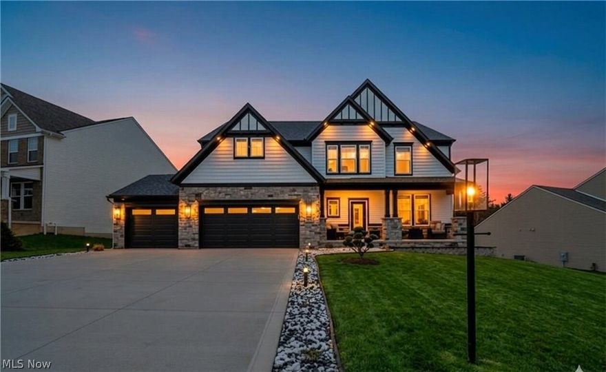 Nestled in the heart of Medina, this stunning home redefines luxury living with an exquisite blend of modern elegance and cozy warmth. The open-concept layout invites you in, creating an atmosphere that feels both expansive and intimate. The great room is anchored by a magnificent stone fireplace, serving as a breathtaking centerpiece that draws family for memorable gatherings. The gourmet kitchen is a chef's dream, featuring beautiful white cabinetry that harmonizes perfectly with the sleek quartz countertops. A spacious center island provides ample space for meal prep and casual dining, making it the heart of the home. Every detail has been meticulously considered, from the custom backsplash to the high-end KitchenAid appliances, ensuring functionality meets style. Retreat to the luxurious primary suite which boasts an impressive custom closet that makes organization effortless and stylish. The spa-inspired bathroom features lighted mirrors and a rejuvenating shower, providing a serene escape from the everyday hustle. Step outside to discover a meticulously landscaped exterior adorned with landscape lighting, that enhances curb appeal. The property also includes a practical shed. This smart home is equipped with a state-of-the-art Control4 system, Cat 6 wiring, and a whole-home audio system that includes 26 speakers, ensuring entertainment flows seamlessly throughout the space. The finished garage is a haven for car enthusiasts, featuring an epoxy floor, custom storage with loft space, an EV 20/50 plug, and programmable lighting. Venture to the lower level where a soundproof theatre room awaits, high-end audio system, perfect for movie nights. The rec room adds a layer of fun with a pool table ensuring endless entertainment. For fitness enthusiasts, a dedicated gym equipped w/ rubber flooring beckons. This exceptional home boasts luxury upgrades throughout, offering turnkey convenience in a prime location.