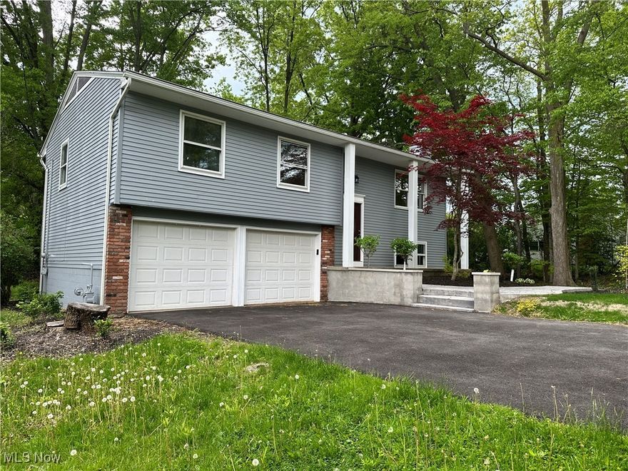 Welcome to 9744 Andrea Drive, a charming single-family home nestled in the heart of Concord Twp, Ohio. You'll be greeted with a cheerful new front door and landscaped entryway. This inviting residence offers a perfect blend of comfort and convenience, ideal for a wide range of homebuyers seeking a vibrant community.
This well-maintained home features 3 bedrooms and 2.5 bathrooms across 1670 square feet of living space. The open-concept layout includes a spacious living area, perfect for entertaining or relaxing, with plenty of natural light streaming across the wood floors through large windows. The modern kitchen boasts ample cabinetry, stainless steel appliances, new countertops and fixtures, making it a delightful space for culinary enthusiasts. The primary bedroom offers an en-suite bathroom, while additional bedrooms provide flexibility for guests, a home office, or hobbies. The attached two-car garage enters into the lower level living area with a classic fireplace, 1/2 bath and laundry area.
Outside, the property features a naturally maintained lawn with nice, fresh landscaping, winding walkways, a private backyard, a ground floor, stamped concrete patio and a 2nd story deck, ideal for outdoor activities or quiet evenings. 
Located in the 44060 zip code, this home is just minutes from local amenities, including shopping, dining, parks, and top-rated schools. With easy access to major highways, commuting to nearby cities is a breeze.
 Don’t miss the opportunity to make 9744 Andrea Drive your new home—schedule a showing today!