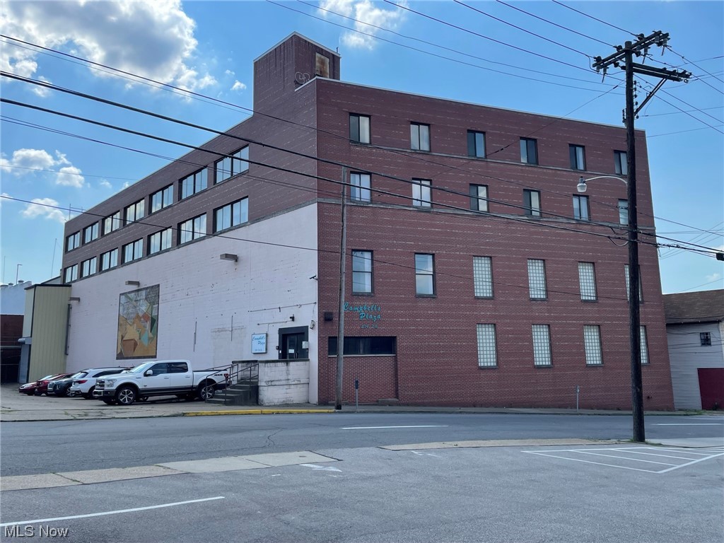 Approximately 50,000 plus square foot building with 5 floors. Features two elevators, one servicing all 5 levels. The second is a freight elevator servicing floor levels 2-3. Outside fire escape stair exits to all levels. Plenty of electric in place. 2nd and 3rd floors have raised flooring for underfloor infrastructure. Walking distance to WVU Hospital and all its facilities. Two parking lots, one off 7th Street, and the other off Juliana Street. Great potential for this Downtown Parkersburg location. 70+ parking spaces.