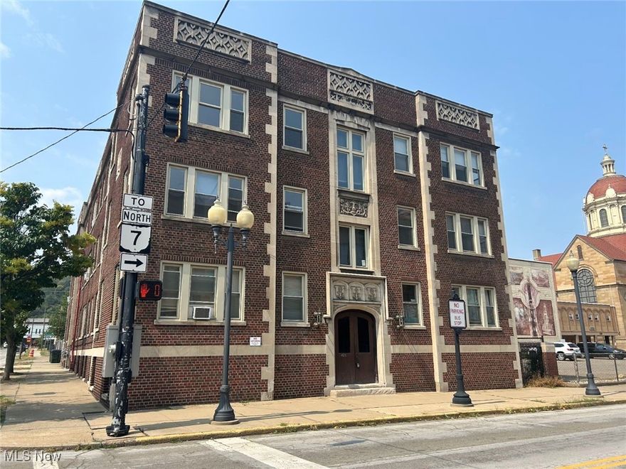 This is an exceptional opportunity to acquire a substantial commercial asset featuring one classic, all-brick building with 18 one-bedroom apartment units with coin-operated laundry on site. The property occupies a corner lot in a prime rental market, offering stable, consistent income potential.
140 Brand-new Energy-efficient replacement windows with flashing (2024), New Puma XL roof system, FM approved, UL790 Class A fire rating, full manufacturer and contractor warranty (2023), New boiler - high-efficiency heating system installed 2023.  Most units feature refinished, renovated kitchens and refreshed bathrooms.
Each unit contributes to a portfolio designed for tenant appeal, boasting classic hardwood floors and fully equipped kitchens. The location is truly unbeatable, placing tenants within minutes of Franciscan University and providing immediate, walkable access to a school, dining options, bus stops, churches, and many other essential community amenities.
