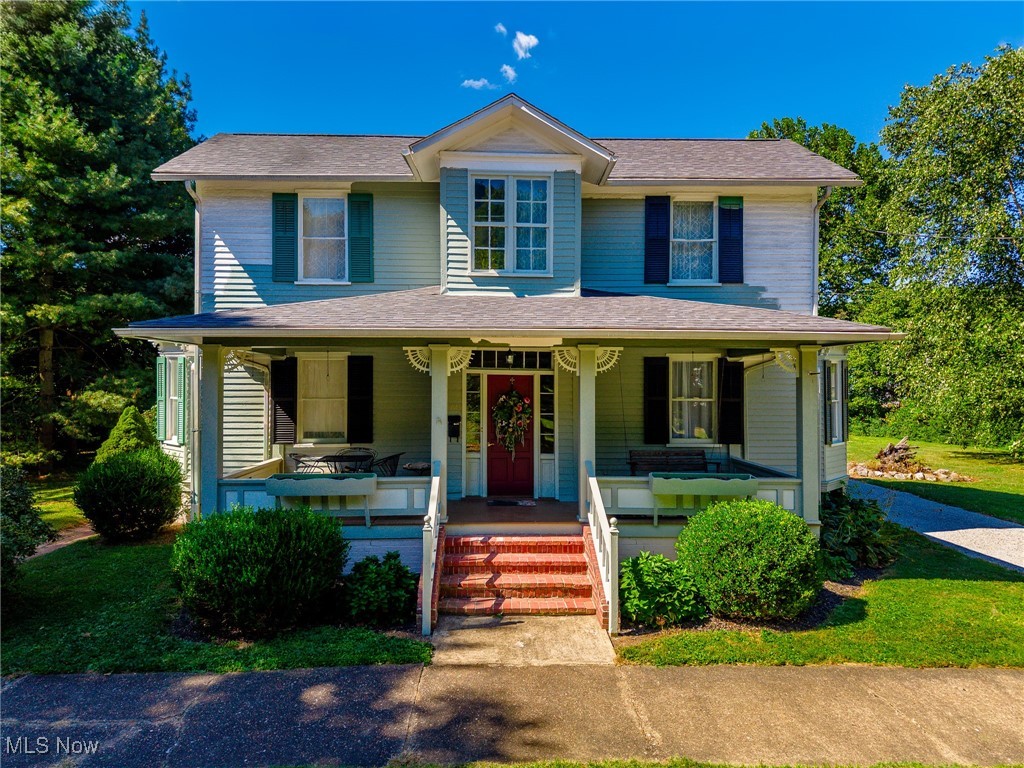 Step back in time with this 1860 charmer in historic Marietta, Ohio! Sitting gracefully on a spacious triple lot, this timeless home showcases bay window offsets that highlight its classic architecture. The wide front porch, complete with a swing, invites you to linger and enjoy the character of a bygone era, while the intricate trim details and tall windows remind you why homes of this period are so treasured. The current owners purchased this home with a vision in mind, but a rare opportunity has presented itself—allowing someone new to step in and carry that vision forward. This is your chance to add the finishing touches and truly make this historic beauty shine once again. Inside, the home echoes history the moment you step through the door, greeted by the original staircase and tall ceilings that tell stories of another era. The main level offers a spacious eat-in kitchen with brand new stainless steel appliances, a new full bath combined with laundry, and freshly painted walls throughout. The layout features a large parlor along with a family room or dining room option, first first-floor bedroom, giving you flexibility to create the living spaces you need. Upstairs, you’ll find two spacious bedrooms along with a full bath that still showcases its original clawfoot tub—a true nod to the home’s vintage charm. Outside, the updates continue with a two-car garage featuring a brand new door, an additional sheds, and plenty of yard space for gardens or gatherings on this triple lot in downtown Marietta. The exterior is currently in the process of being repainted and will be completed by the sellers, while a new roof was just installed in the summer of 2025, providing peace of mind for years to come. This home offers the perfect blend of historic character and modern updates—ready for you to put your stamp on and make it your own.