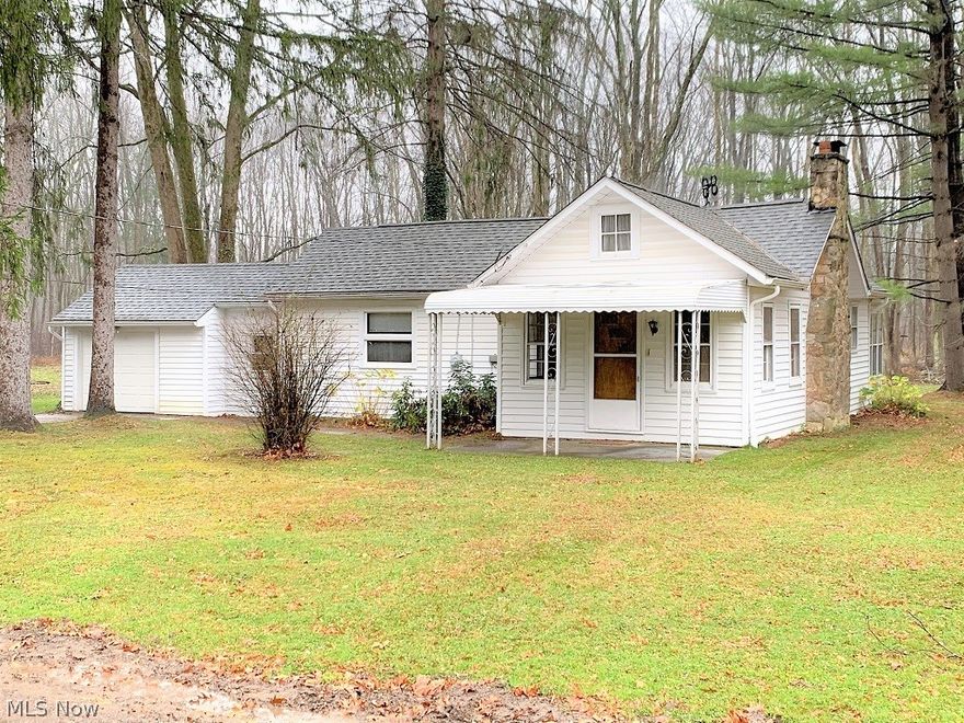 This cozy ranch style home has all the conveniences that first floor living can offer. Come in under the covered front porch to a nice size den that leads to a spacious living room with a warm natural stone fireplace. The eat-in kitchen goes out to a very large sunroom. The spacious bedroom is close to the full bathroom and has a nice size closet. There is a bonus room between this and the attached garage that can be used for your certain needs. This just over a half acre property is on a very quiet private drive. Minutes away from historical Chardon village and everything Chardon has to offer.