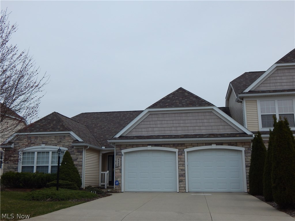 An Oasis in the City, Newer Ranch style Condo featuring Vaulted ceilings, extended Sun room overlooking wooded area. Enjoy the luxury of owners suit featuring vaulted ceilings, walk in closet and master bath. Soaking tub, walk in shower double sinks. Beautiful open kitchen with granite counter tops, stainless steal appliances wood floor. Office could be third bedroom, Sun room allows for extended living space, Stone cover patio with privacy.
Attached two car garage with additional storage. Outstanding location, beauty at it's best, near shopping, parks, and Rt.8