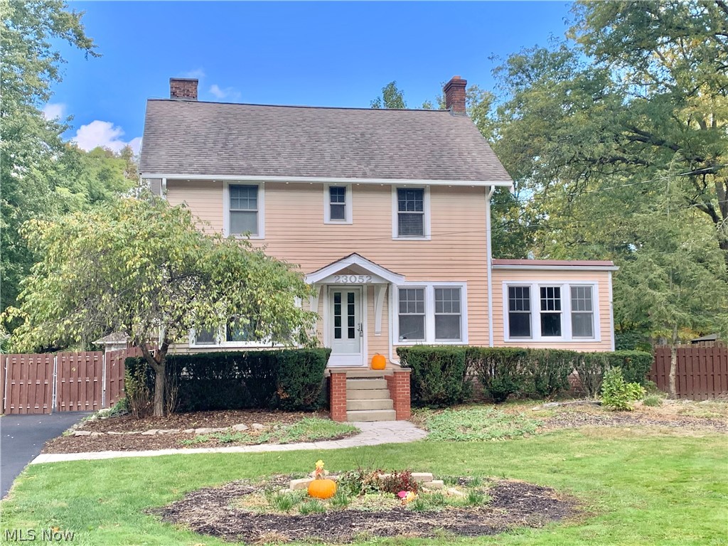 This modern farmhouse on 1.5 acres in North Olmsted is is full of charm! The first floor has beautiful hardwood floors throughout. The kitchen was updated in 2019 and the spacious living room has a fireplace and built-ins. The cozy family room/sunroom also has a fireplace and built-ins. Enjoy the three seasons room off the kitchen with natural light and view of the spacious backyard. Upstairs you will find three bedrooms and a bathroom that included updated plumbing and and washer/dryer hookups for convenience. Large walkup, floored attic on the third floor. Three car garage has a heated workshop area. Backyard has a privacy fence and a paver patio. This home is a must see! Close to shopping, dining and the metro parks. Schedule a showing today!