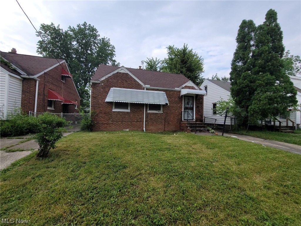 Brick Bungalow with large rear yard and Detached garage. Detached garage needs walls restructured garage is leaning. 2 bedrooms on 1st floor and one bedroom on 2nd floor. Full bathroom on first floor. Basement has a rec room on one half and mechanical/laundry room on the other half. Furnace and AC present however need TLC. HWT present however whole plumbing system needs attention. Get opportunity in cleveland east side area