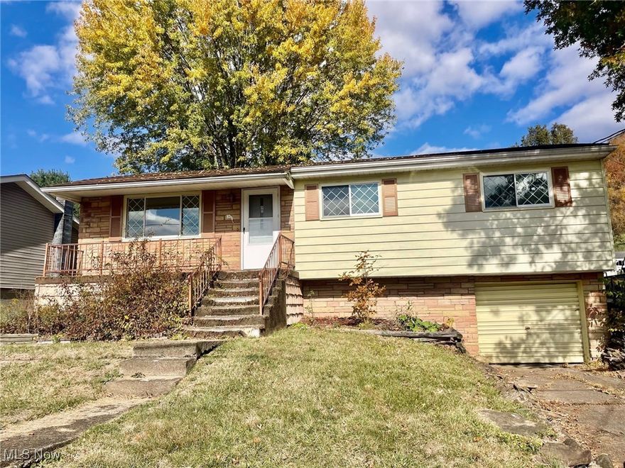 Enjoy easy one-level living in this mid-century modern style ranch home on a cul-de-sac. This HUD foreclosure property needs some TLC but offers 3 bedrooms and 1.5 bathrooms as well as a large basement rec room with bar. The backyard features a covered deck and flat, fenced back yard with a shed. A 1-car built-in garage completes the package.