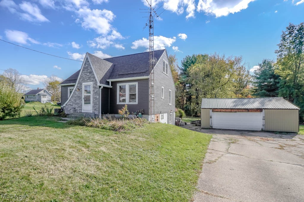 If you’re looking for a home with character in a peaceful country setting, this is it. This 3 bedroom home sits on an acre of land with apple and pear trees, plus hazelnut, elderberry, and blackberry bushes, and plenty of space for a garden. Inside, the vintage inspired kitchen features a newer induction stove, and the living and dining rooms connect through an arched opening. One bedroom and a full bath are on the main floor, with two more bedrooms upstairs featuring high ceilings. A full walkout basement adds extra space for storage or projects, and the 24x30 detached garage provides ample room for parking and equipment. Recent updates include a new roof, siding, and windows with transferable warranties for extra peace of mind. A wonderful find you don’t want to miss, call today!
