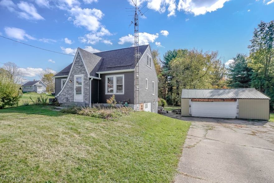 If you’re looking for a home with character in a peaceful country setting, this is it. This 3 bedroom home sits on an acre of land with apple and pear trees, plus hazelnut, elderberry, and blackberry bushes, and plenty of space for a garden. Inside, the vintage inspired kitchen features a newer induction stove, and the living and dining rooms connect through an arched opening. One bedroom and a full bath are on the main floor, with two more bedrooms upstairs featuring high ceilings. A full walkout basement adds extra space for storage or projects, and the 24x30 detached garage provides ample room for parking and equipment. Recent updates include a new roof, siding, and windows with transferable warranties for extra peace of mind. A wonderful find you don’t want to miss, call today!
