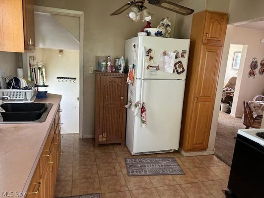 Here is a great Wickliffe home for a first -time homeowner or investment buyer. This home is located on a nice lot with three bedrooms and i bathroom.  There is an eat - in kitchen where the stove will remain. The large living room and dining room are carpeted, the basement has a newer furnace and hot water tank, and the electrical has been updated. The seller will complete the Wickliffe point of sale. Home is within the new school campus area and close to shopping, parks, and freeways.