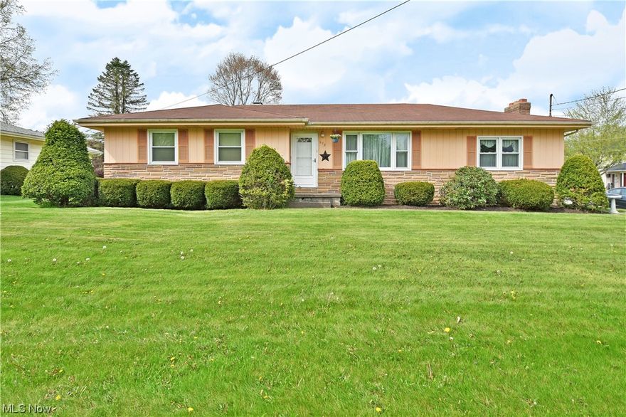 Don’t miss the excellent opportunity and huge potential of this move-in-ready 3-4 bedroom Campbell home! With its desirable ranch layout, a partially finished basement, and a massive, detached garage (24'x40'), this prominent corner property checks all the right boxes. A concrete drive with an oversized apron leads up to the 4+ vehicle garage as a relaxing sunroom offers casual, everyday access. Meanwhile, a winding sidewalk sprawls past manicured landscaping to find the formal entryway amongst the brick trim work. Through the front door, a spacious living room awaits with hardwood flooring as it basks in the natural light from the ample picture window. Built-in storage joins a serving window at the far wall, peering into the nearby kitchen and dining areas. Hardwoods continue through the main floor, as the kitchen delights with a faux brick backsplash that follows its marble-look countertops. The quaint dining space looks on near the basement entryway. Around the corner, an impressive