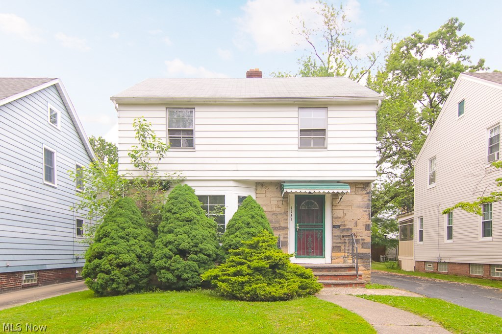 Gorgeous turn key colonial home with refinished hardwood flooring throughout! Living room with beautiful bay window opens to the formal dining room with a door that opens to the private & green backyard that is ideal for outdoor entertaining! Spacious kitchen that was just completely renovated has a breakfast nook and comes with dishwasher, exhaust fan and fridge! Half bathroom is located off the rec room in the basement (tiled and great family room!). 3 bedroom and the full bathroom are located on the 2nd floor. Full bathroom was just fully remodeled with ceramic tiling, new fixtures and pedestal sink! 3rd floor has carpeted 4th bedroom or office area! Do not miss out on this Cleveland Heights home! Buyer to assume POS violations.