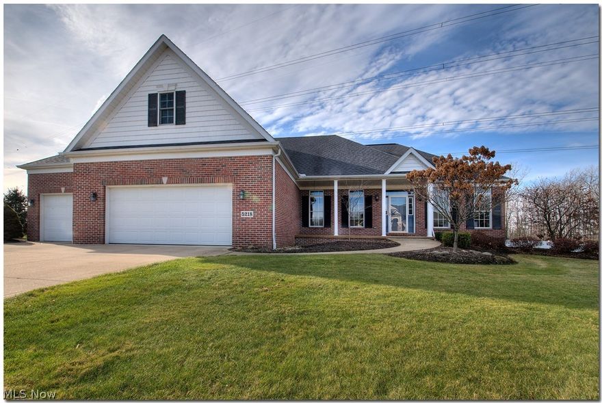 This House has it All! Custom built in 2006 this Ranch Home has so much to offer.  The first floor has wood floors throughout and boasts an open concept with a huge dining and living room.  The living room has vaulted ceilings and a fireplace with new gas logs (2017). The living space is open to the kitchen which includes Kraftmaid cabinetry, solid surface countertops and a new gas range and Microwave (2016).  The first floor layout includes a spacious master suite with full bath and walk-in closet, two more bedrooms and another full bath are on the opposite side of the home.  Also on the first level is the Laundry room with half bath and access to the three car garage with epoxy floor.  The lower level has another full bathroom and bedroom with egress window.  Also on the lower level is another large living space with home theater set up which as a bonus is to remain with the home.  Off the back of the home is a nice low maintenance composite deck with retractable awning.  This nicely