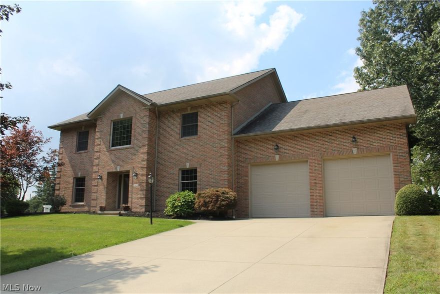 EXTREME HOME MAKEOVER! Seller took this home off the market and put NEW FLOORS, painted FRESH PAINT, and manicured the landscaping! Plum Brook golf course is in the backyard. Large custom home with 4 big bedrooms up and a first floor study/den that could be a 5th bedroom or a nice guest suite. This beautiful, spacious, all-brick home is built with quality construction. Large eat-in kitchen with granite countertops and stainless steel appliances, large formal dining room, front sitting room and a very generous first floor laundry and separate room for coats and shoes. Family room w/gorgeous stone fireplace with gas logs with remote control. 9' ceilings on the 1st floor and a finished 20 x 27 bonus room on the second floor. The oversized 4-car garage is big enough for cars, boats & toys - and a golf cart. This beautiful home has a HUGE finished basement and is located on a quiet street in HURON TOWNSHIP. Low utility budgets.