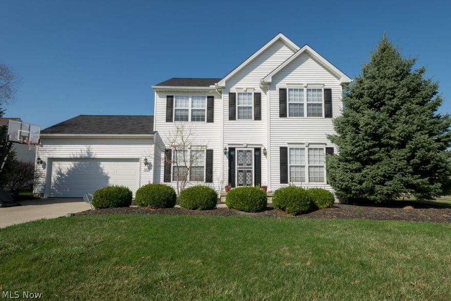 Beautiful 4 bedroom home on a corner lot has an open floor plan. Living Room has fireplace and large windows to enjoy the beauty of outside. Large open Kitchen with marble countertops, plenty of cabinet space, and an island. Kitchenette is surrounded by windows and skylights with sliding glass doors that lead to the back yard. Formal dining room has tray ceiling and two large windows to let the light in.  Finished basement has family room with bar area and additional seating to relax. 2-car attached garage.  Schedule your appointment today to visit this MUST SEE home!  Bar does not stay.